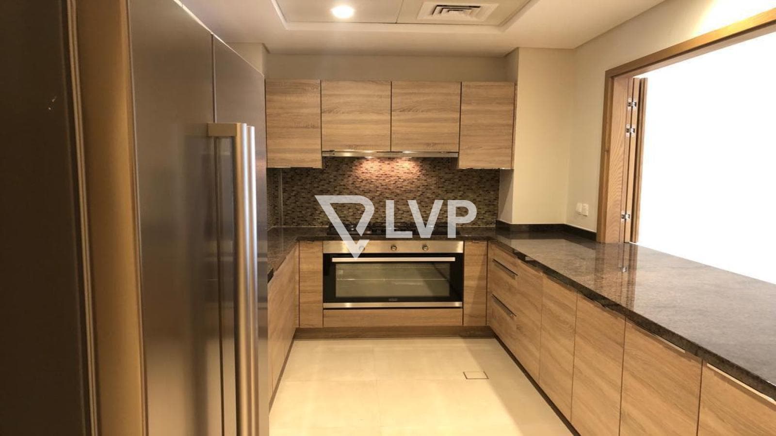 Community View | 2BR + Maid | Equipped Kitchen — photo 3
